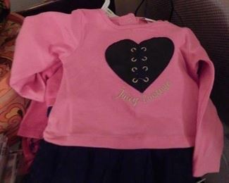 New with tags designer baby clothes.