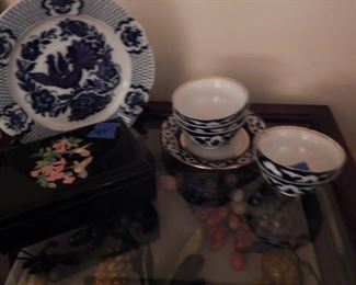 Old china, display table and stone fruit.