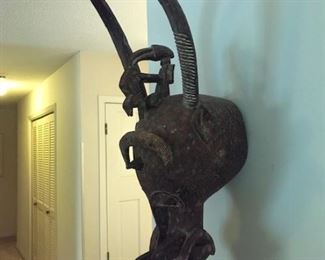 #15 African, Dogon, Kanaga mask, 39”h. Has condition issue. 