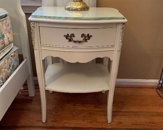 #27	French provincial bed side table with glass top 21"x16"x28"	 $40.00 
