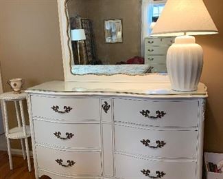 #28 French provincial dresser with mirror and glass top 57"x20"x35" $125.00