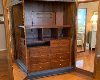 #30	Beautiful blue distressed armoire  with two full sized mirrored doors and 7 drawers 49"x23.5"x76"	 $100.00 
