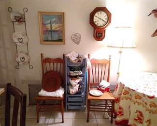 Turned wood chairs, clock, vintage linens