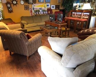 We have more contemporary fabric sofa's, love seats, and casual chairs!