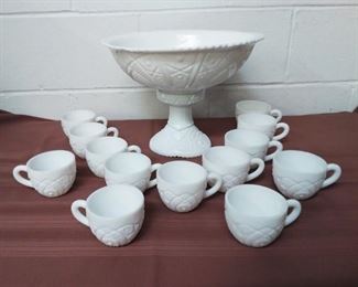 Milk Glass Punch Bowl With 13 Cups
Lot #: 50