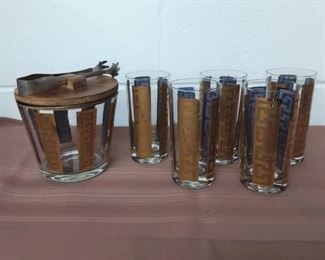 Gold Gilt Glass And Ice Bucket Set
Lot #: 52
