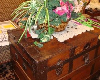 Large antique wood travel trunk.