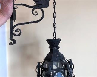One of a pair antique wrought iron lantern