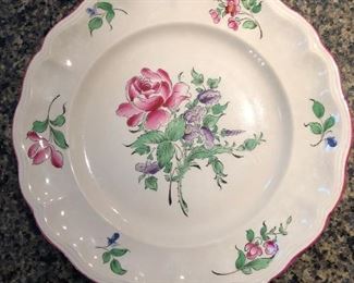 One of several hand painted French plates