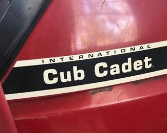 Outside storage building at back of the house - vintage Cub Cadet