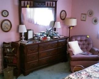 Dresser with mirror, dresser lamps, boudoir chair, floor lamp, magazine rack, etc.
