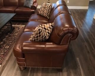Beautiful brown leather 3 cushion couch