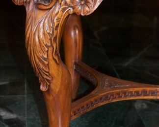 Ornately carved table 