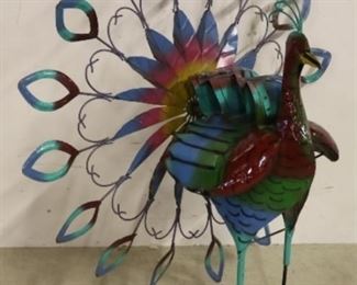 Metal peacock spinner