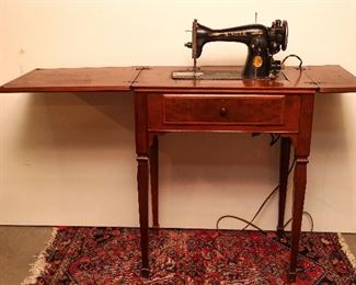 Antique Singer Sewing Machine with Attached Lamp Light and Cabinet 