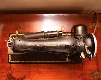 Antique Singer Sewing Machine with Attached Lamp Light and Cabinet 