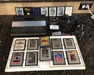 Atari 7800 Game System, with 2 controllers, and 17 games