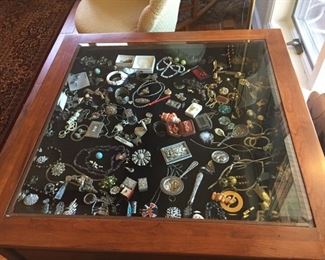 Display table with eclectic collection