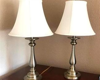 Pair of Table Lamps	
Brushed Silver color with Cream Shades - 28"h