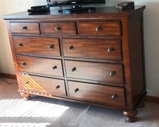Two Chests of Drawers	
Similar color; First is 64-1/2"w x 19"d x 45"h - Nine drawers; Second is 44"w x 20"d x36"h - jewelry drawer plus four other drawers