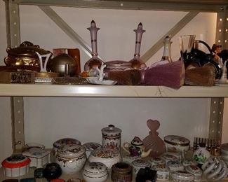 Perfume bottles, small porcelain boxes, Half-doll brushes (lying on top shelf...)