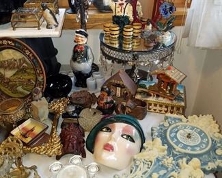 An amazing collection. Blue clock (running) is Incolay resin from 1970's