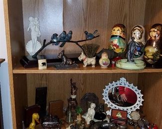 Nesting Russian dolls, Cast metal items, etc.