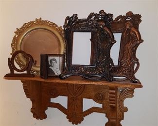 Shelf displaying frames
