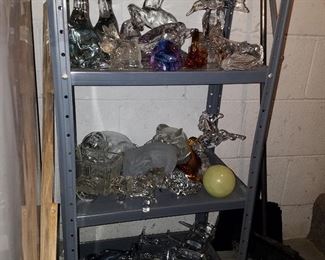 Glass figurines. Bird in flight (upper right) is a flower frog
