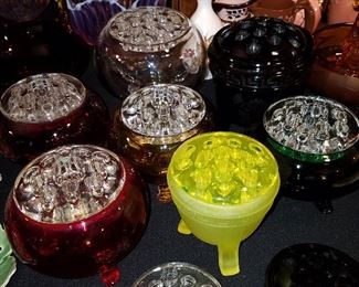 Viking flower frog bowls in several colors, plus other flower frogs. Vaseline frog with crack in top.