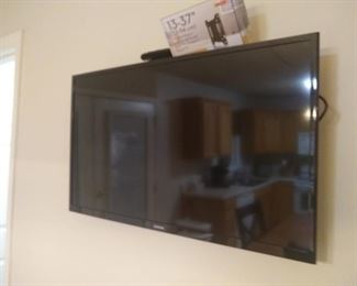 Several flat screens in home