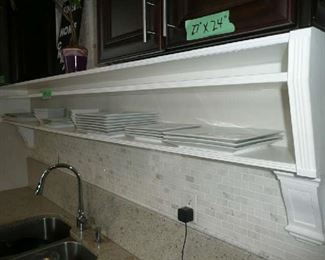 Shelve under the cabinets. 99" X 21"