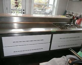 This is the 2nd part of the kitchen, The SS Island Bosch with 4 very large storage drawer with Granite serving counter.