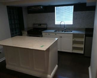 Basement Kitchen Cabinets with Island, Granite Counters, SS Sink & Faucet. $850.00.