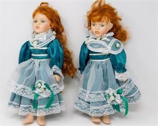 63. Two 2 Porcelain Red Haired Dolls
