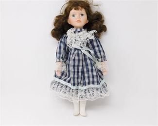 65. Doll with Plaid Dress
