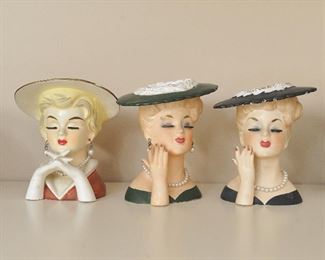 Three vintage lady head vases