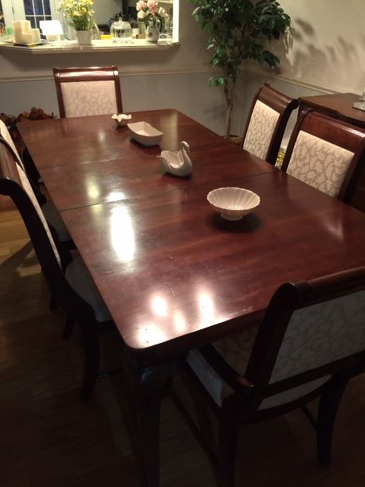 Nice dining room table - Lennox items on the table - has table pads, also