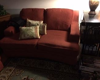 Great couch and side table with lots of DVDs 