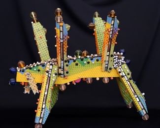 Sculpture. Mixed media sculpture of an untitled four-legged creature, which Kamrowski referred to as “Globs”.  Multicolor painted wooden body with applied, beads, spheres, and tiles. Not signed, number "417". Some wear and replacement beads. Measures 28" x 36" high overall. Reference #K.9 
