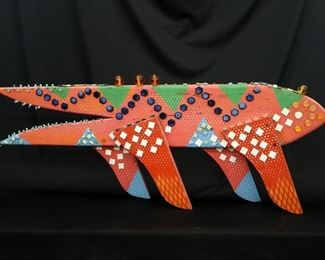 Sculpture, “Hyena Love”. Mixed media sculpture of a four-legged creature, titled "Hyena Love".  Multi-color painted wooded body with applied, beads, spheres, reflectors and tiles. Not signed, numbered "417". Some wear and replacement beads. Measures 64" x 24" high. Reference #K.11 