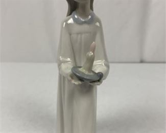 Lot 017
Lladro Porcelain Figurine Girl Holding A Candle