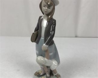 Lot 018
Lladro Porcelain Figurine Girl With Baby Doll