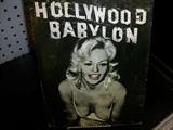 Hollywood Babylon book. A book of who did what to whom and when and where and how much the piper had to be paid. Great gift item