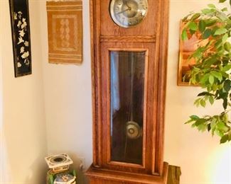 Grandfather clock (has crack).
