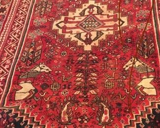 Over a dozen semi antique rugs...great sizes great prices