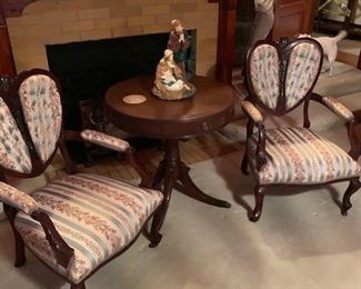 Two matching chairs and mahogany table 
