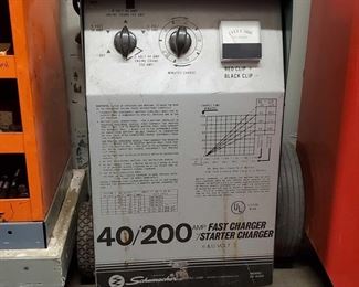 4022: Schumacher 40/200 AMP Fast Charger w/ Starter Charger 6&12 Volt
Model #- SE-4020 measures approx 12"x12"x35"