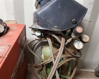 4027: 2 Acetylene Tanks with Hoses and a Helmet
2 Acetylene Tanks with Hoses and a Helmet