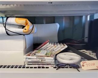 3508: Wii Games and Accessories
Includes Komani pads, 2 gutair hero gutairs, remotes, joy sticks, approx 13 games and more!!!